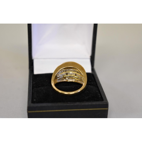 409 - A baguette and brilliant cut diamond set gold ring, hallmarked 9ct ring, 1ct approximately, 4.6... 