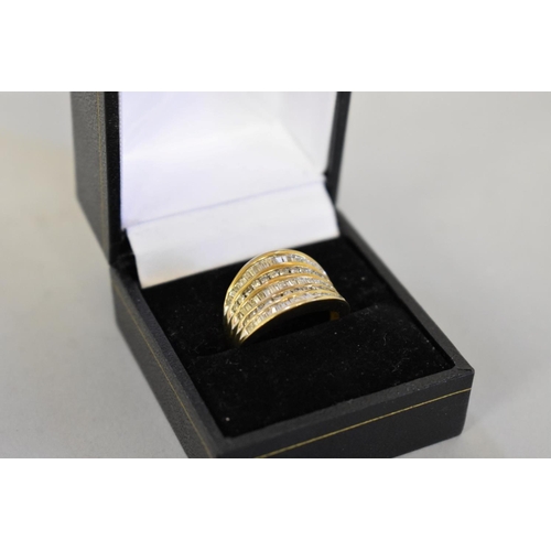 409 - A baguette and brilliant cut diamond set gold ring, hallmarked 9ct ring, 1ct approximately, 4.6... 