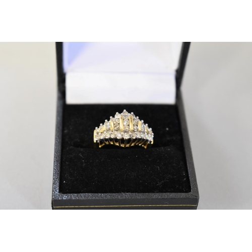 411 - A diamond cluster gold ring, hallmarked 14ct, 0.5ct approximately, 5.6g total weight.... 