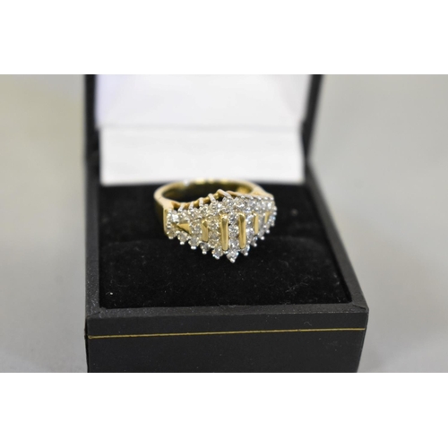 411 - A diamond cluster gold ring, hallmarked 14ct, 0.5ct approximately, 5.6g total weight.... 