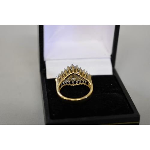 411 - A diamond cluster gold ring, hallmarked 14ct, 0.5ct approximately, 5.6g total weight.... 