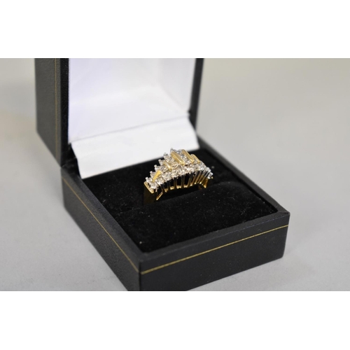 411 - A diamond cluster gold ring, hallmarked 14ct, 0.5ct approximately, 5.6g total weight.... 