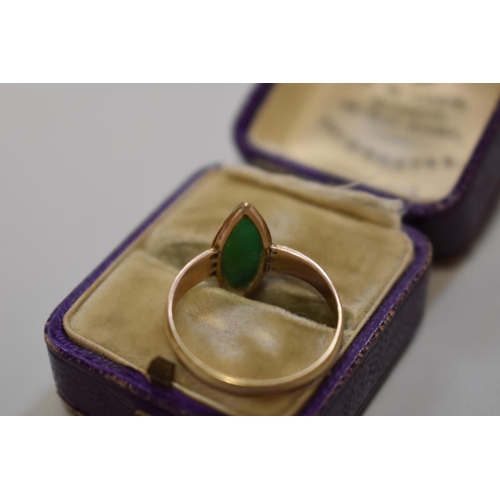 415 - A moss agate carved cameo gold ring, stamped 9ct, 2.3g total weight.