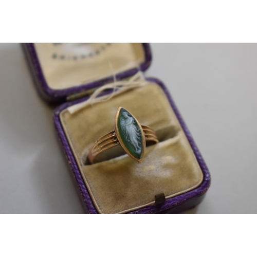 415 - A moss agate carved cameo gold ring, stamped 9ct, 2.3g total weight.