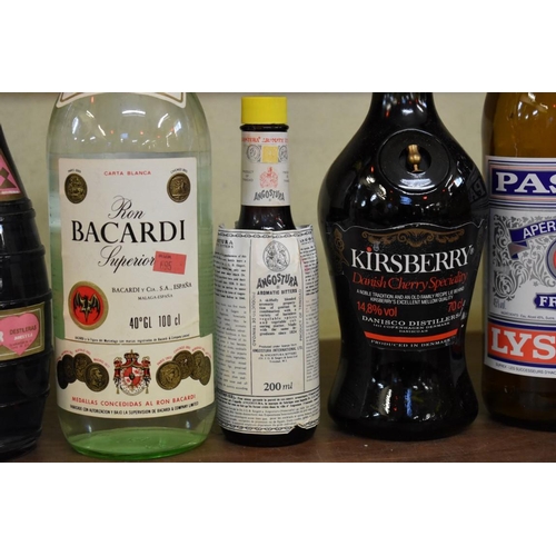 103 - A mixed lot of liqueurs and spirits. 