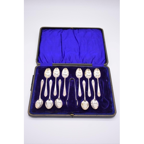 386 - A cased set of eleven silver teaspoons and tongs, by John Round & Son Ltd, Sheffield 1915, ... 