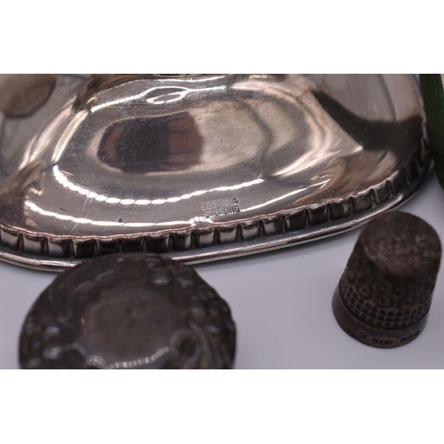 390 - A selection of various silver and silver mounted items, to include, a pair of Celtic bottle holders,... 