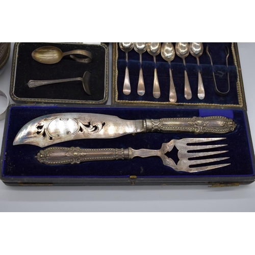 392 - A quantity of silver and silver plated items, to include two Victorian cased sets of electroplated f... 