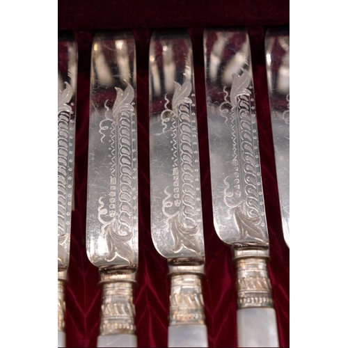 395 - A mahogany cased set of twelve mother of pearl and electroplated fish knives and forks, by Walker an... 