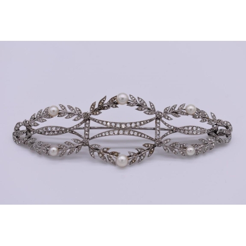 398 - An Edwardian diamond and half pearl curved brooch/barrette, the unmarked milgrain setting in form of... 