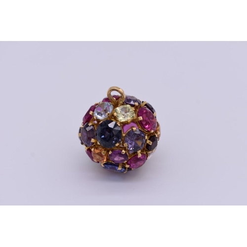 401 - A semi-precious gem set ball pendant, having multi coloured stones of various shapes and sizes, moun... 