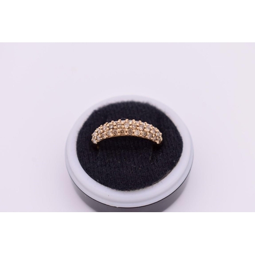 410 - A fancy yellow diamond pave set gold ring, hallmarked 9ct, 0.4ct approximately, 2.7g total weight.... 