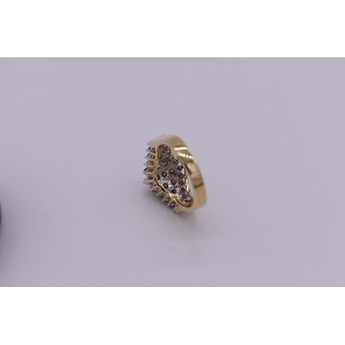 411 - A diamond cluster gold ring, hallmarked 14ct, 0.5ct approximately, 5.6g total weight.... 