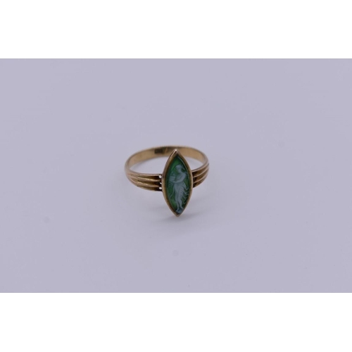 415 - A moss agate carved cameo gold ring, stamped 9ct, 2.3g total weight.