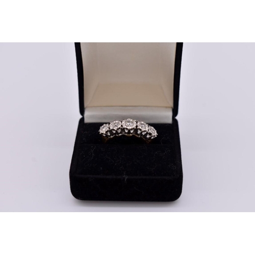 416 - A diamond five stone gold ring, hallmarked 18ct, 0.45ct approximately, 5.2g total weight.... 