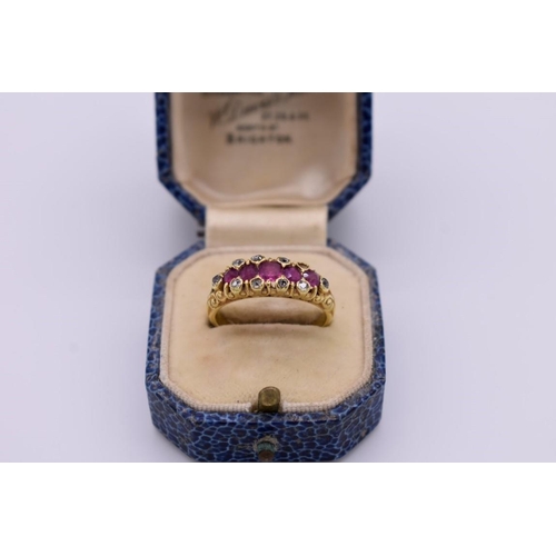 419 - A ruby and diamond gypsy set gold ring, stamped 18, 5.2g total weight, (one stone missing).... 