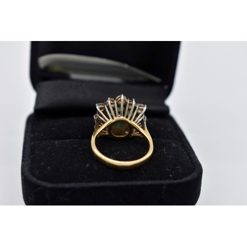 421 - An emerald and diamond cluster gold ring, hallmarked 18ct, 6.5g total weight.