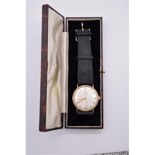 500 - A vintage Omega 9ct gold automatic wristwatch, 32mm, on replacement leather strap.