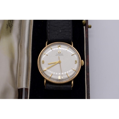 500 - A vintage Omega 9ct gold automatic wristwatch, 32mm, on replacement leather strap.