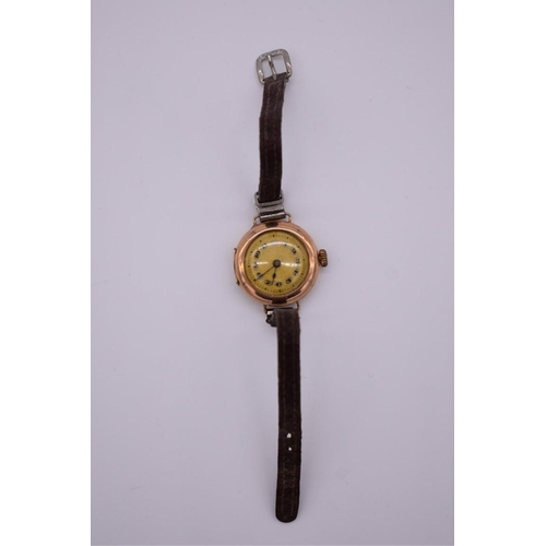 506 - A vintage 9ct gold ladies manual wind wristwatch, on leather strap.