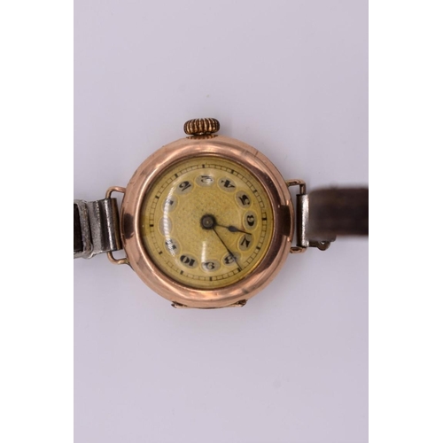 506 - A vintage 9ct gold ladies manual wind wristwatch, on leather strap.