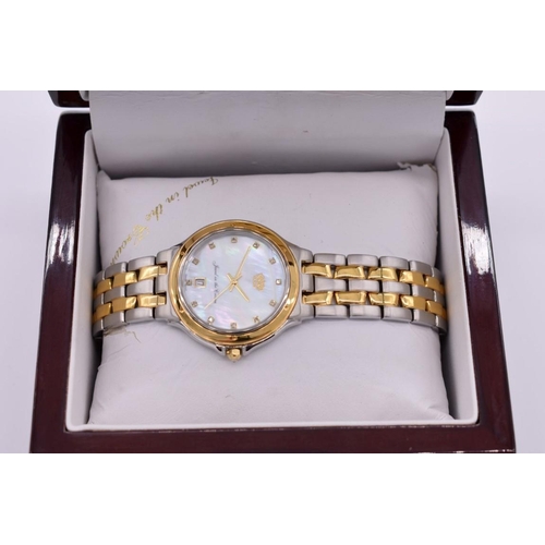 511 - A modern 'Jewel in the Crown' two tone stainless steel quartz wristwatch, with box and papers.... 