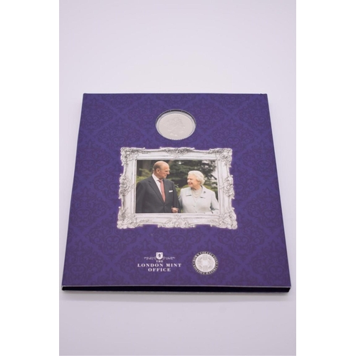 539 - Coins: a London Mint Office 'The Royal Platinum Wedding Photographic Collection', (incomplete b... 