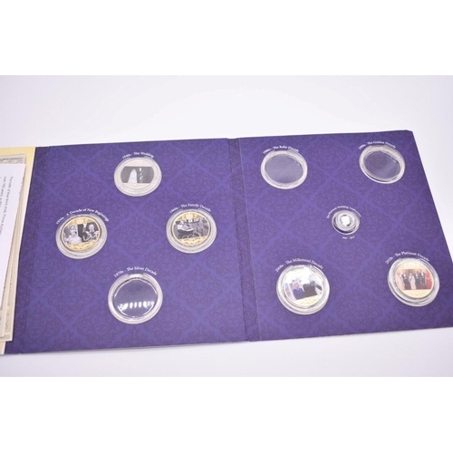 539 - Coins: a London Mint Office 'The Royal Platinum Wedding Photographic Collection', (incomplete b... 