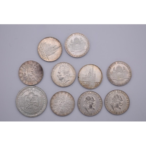 544 - Coins: an Austrian silver 1981 500 Schilling; together with nine Austrian silver 25 Schillings, 141g... 