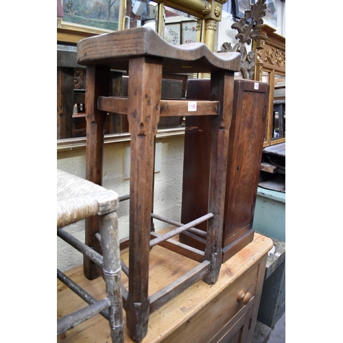 1168 - A Victorian fruitwood and elm stool, with saddle seat, and octagonal turned legs, 76cm high. ... 