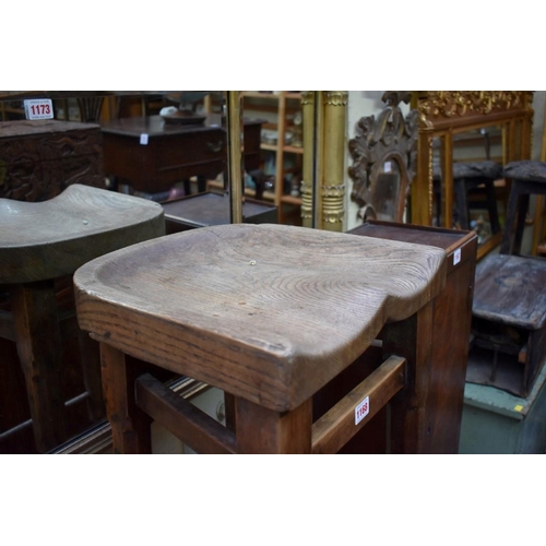 1168 - A Victorian fruitwood and elm stool, with saddle seat, and octagonal turned legs, 76cm high. ... 