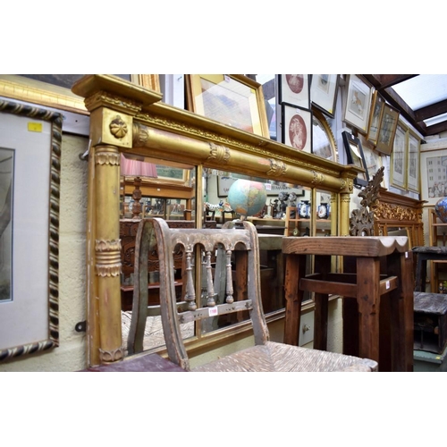 1173 - (HP) An early 19th century gilt framed overmantel wall mirror, 142cm wide. 