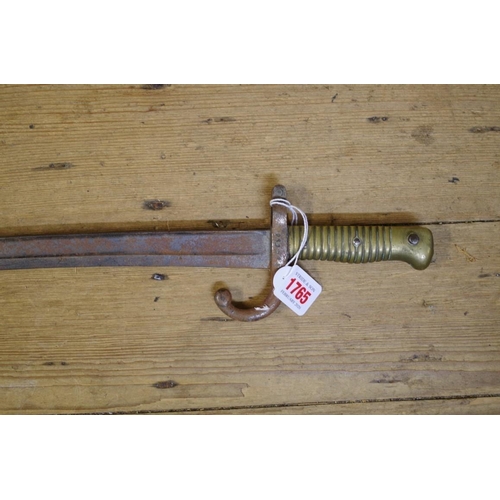 1765 - A French 1866 pattern Chassepot Yataghan sword bayonet, the guard stamped S466730, 57cm blade.... 