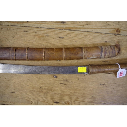 1768 - A Burmese dha and bamboo sheath, 47cm blade.