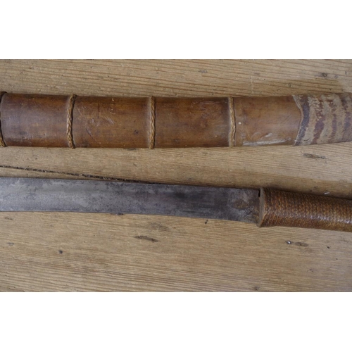 1768 - A Burmese dha and bamboo sheath, 47cm blade.