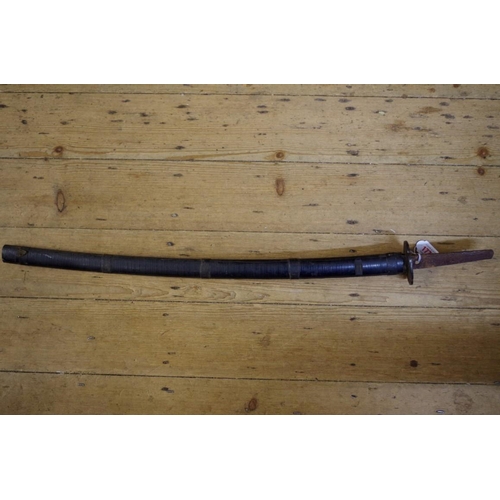 1772 - An antique Japanese katana and lacquered scabbard, the tang signed, with copper tsuba, 70cm blade.... 