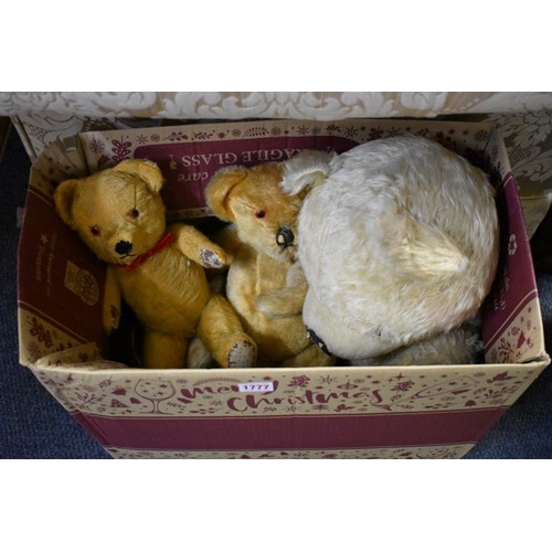 1777 - A circa 1950s large blonde teddy bear; together with two other bears and a dog.