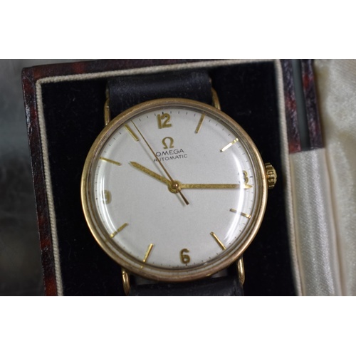 500 - A vintage Omega 9ct gold automatic wristwatch, 32mm, on replacement leather strap.