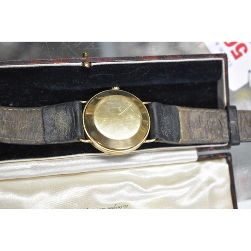 500 - A vintage Omega 9ct gold automatic wristwatch, 32mm, on replacement leather strap.