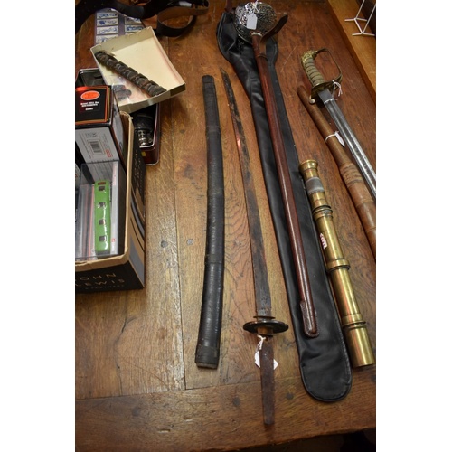 1772 - An antique Japanese katana and lacquered scabbard, the tang signed, with copper tsuba, 70cm blade.... 