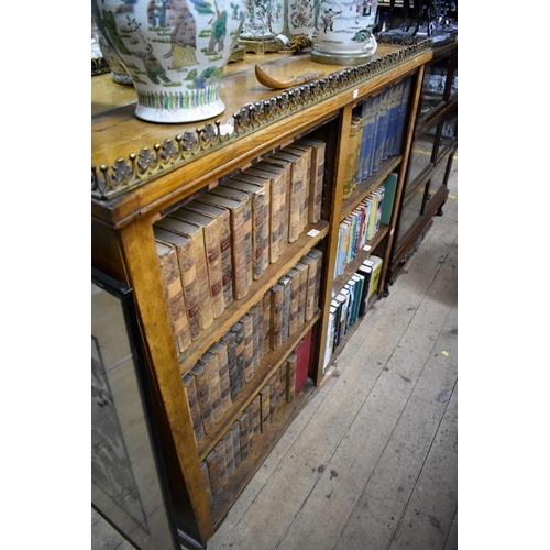 1208 - A pair of Victorian oak open bookcases, with cast brass galleries, variations to width, 161.5cm and ... 