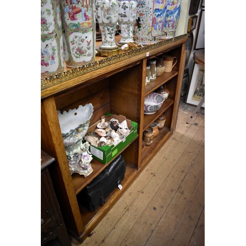 1208 - A pair of Victorian oak open bookcases, with cast brass galleries, variations to width, 161.5cm and ... 