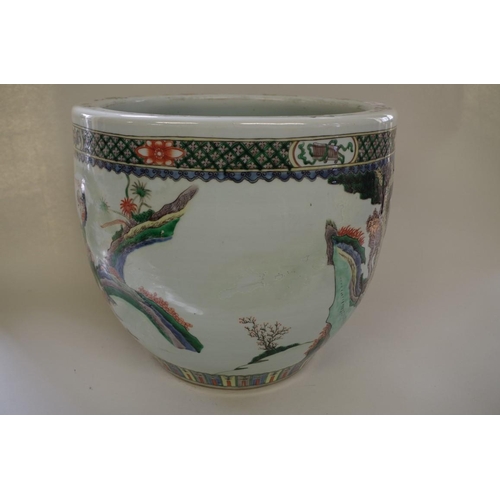 1877 - A Chinese famille verte fish bowl, 19th century, 40.5cm high, (restored).