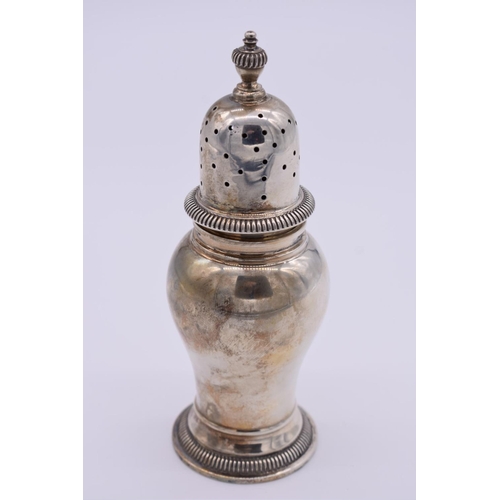 10 - A silver sugar caster, by William Comyns & Sons Ltd, London 1961, 17.5cm high, 218g.... 