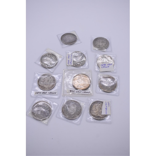 244 - Coins: eleven Victorian silver half crowns, 1880-1901.