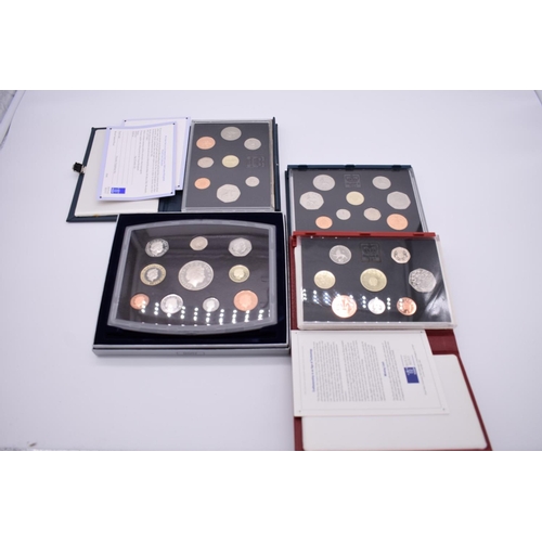 260 - Coins: four Royal Mint UK proof coin sets, 1990, 1992, 1994 and 2000, each with booklet.... 