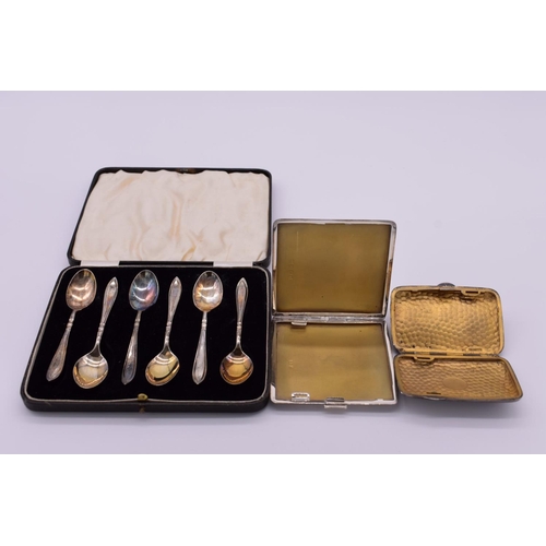 67 - A cased set of six silver coffee spoons, by Barker Brothers Silver Ltd, Birmingham 1935; together wi... 