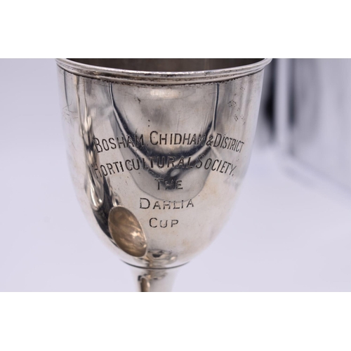 80 - Three silver trophy cups, including a covered example; together with another (a.f), all having stand... 