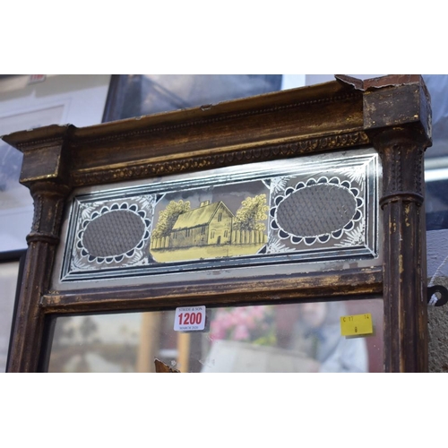 1200 - An early 19th century gilt frame pier mirror, with verre eglomise frieze, 81.5 x 46cm.... 