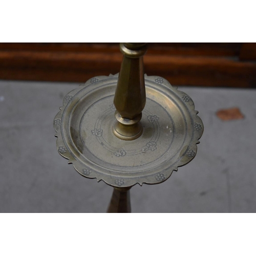 1209 - A large antique Continental brass candlestick, 70cm high.  